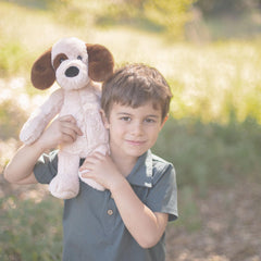 World's Softest Duds Doggie plush fur texture highlighting squishy, cozy cuddle material.
