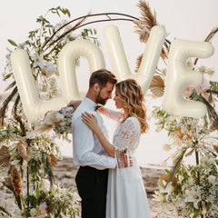 Wpensky 40-inch cream G balloon, photo backdrop focal point for celebrations.