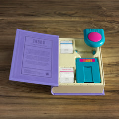 WS Game Company Taboo Vintage Bookshelf Edition fabric-wrap case blends with décor.