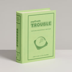 WS Game Company Trouble shelf styling with retro vibe for playful evenings.