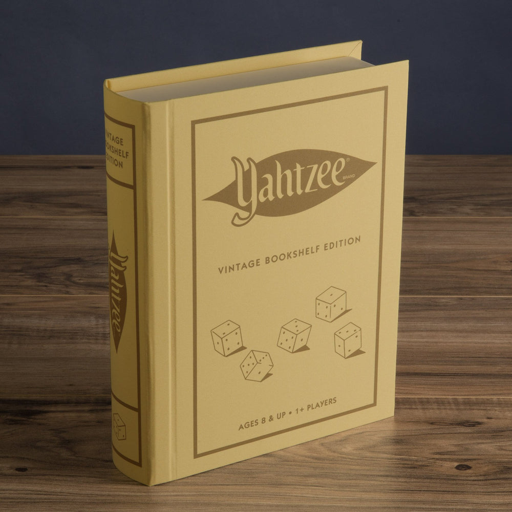 WS Game Company Yahtzee Vintage Bookshelf Edition dice keepers and pencils keep components neat.