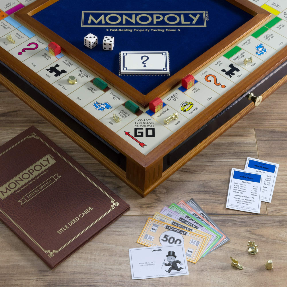 WS Game Company Monopoly Trophy Edition wooden houses and hotels enhance table presence.
