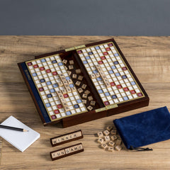 WS Game Company Scrabble Deluxe Built-In Slide-Out Storage keeps components neatly stowed.