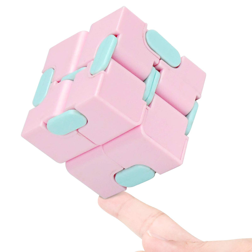 WUQID Infinitycube in macaron pink, closed, discreet stress relief on the go