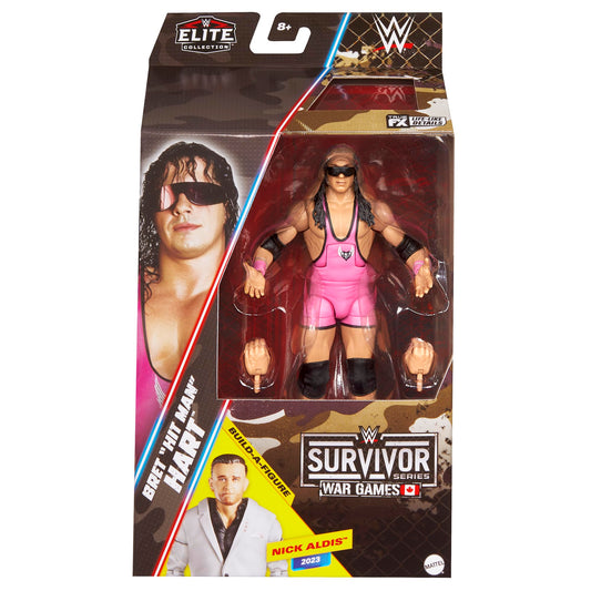 WWE Bret Hart Elite figure in pink singlet posed for display and play.