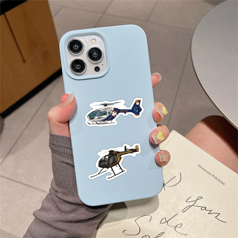 Wyyeleswm helicopter stickers on a laptop for vibrant, long-lasting design