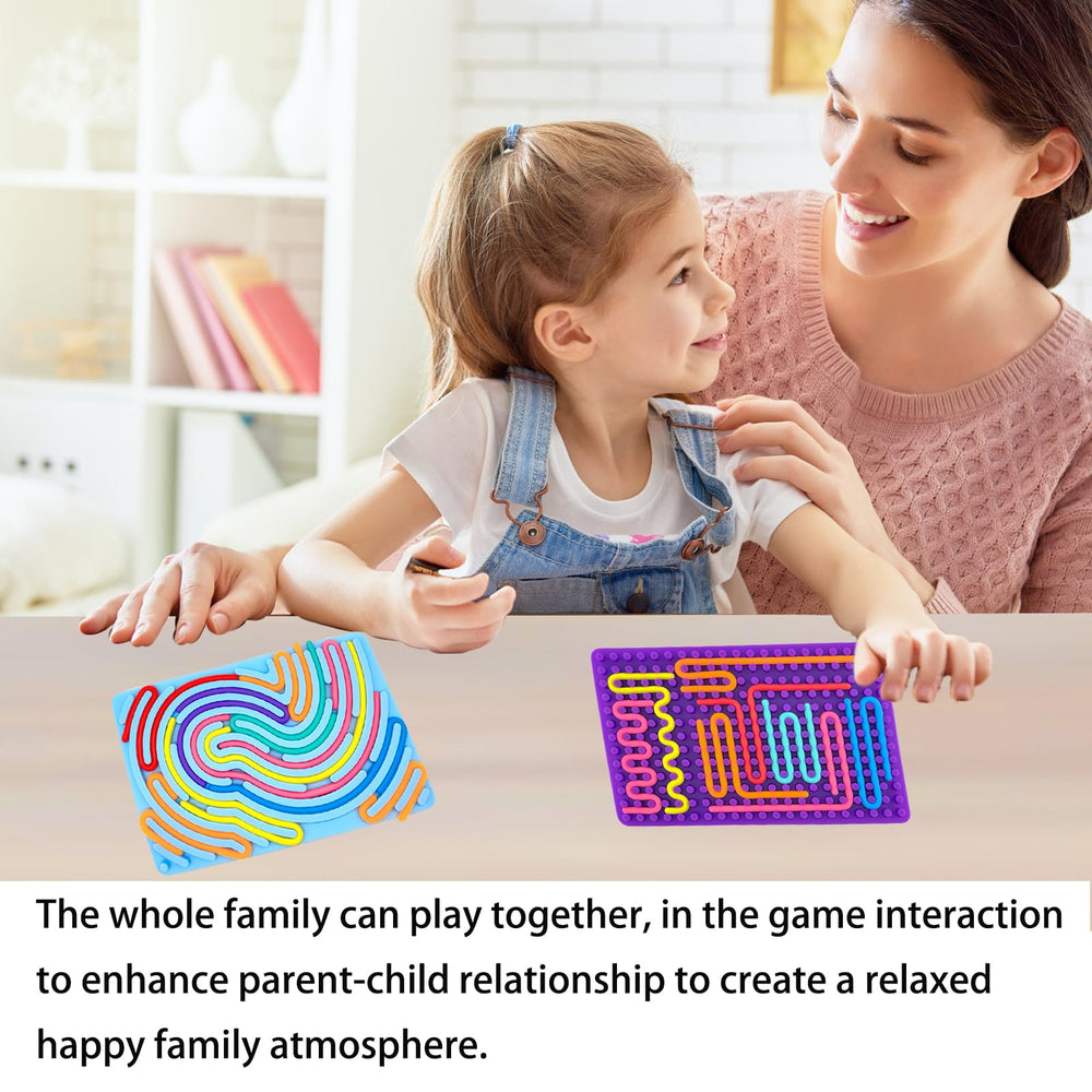 Xesakesi sensory activity board close-up showcasing silicone strings for dexterity