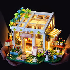 Xingya youpin Flowers House Building Set florals and bicycles enhance garden charm.