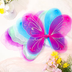 Xtinmee purple wings for kids, durable nylon with bendable frame.