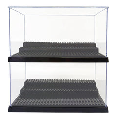 X XIN·SHI minifigure display case with black base highlights figures while protecting them.