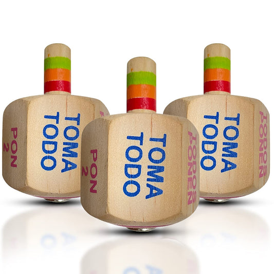 YAJUA Toma Todo Pirinola wood spinner close-up shows handcrafted detail for authentic guest entertainment