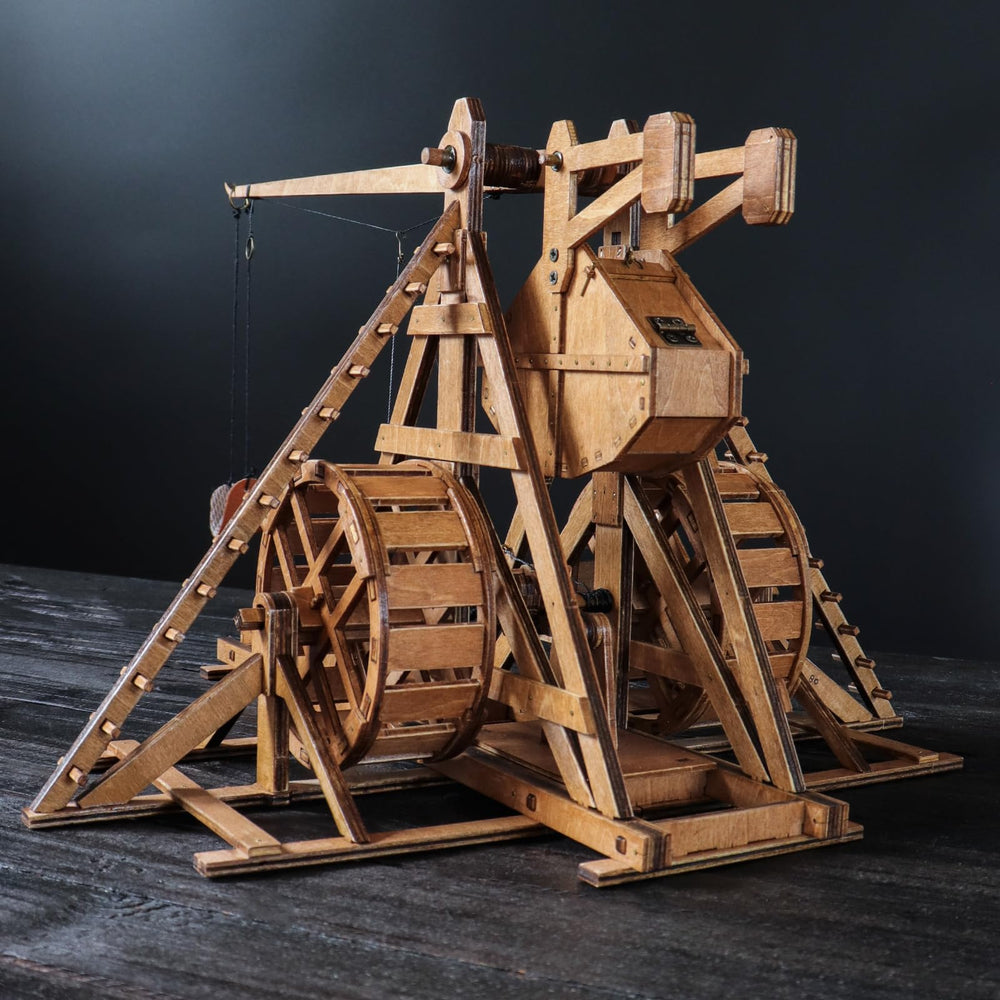 YAQUMW Trebuchet wheel mechanism close-up highlights rolling movement for tabletop play
