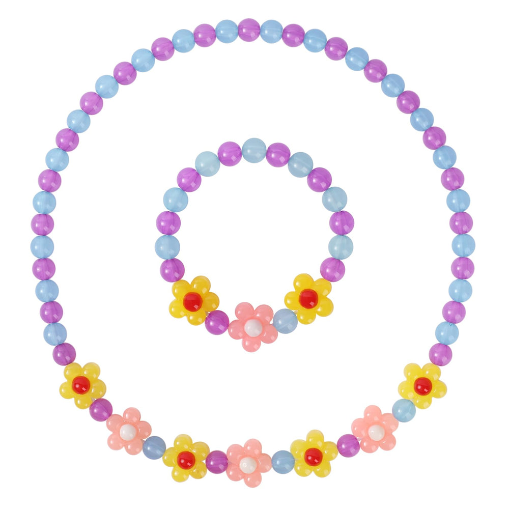 Yarkeuier flower necklace in yellow worn by a toddler for party-ready style