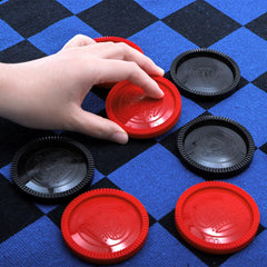 Yarlung blue reversible rug with checkers side for backyard fun.