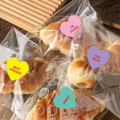 Ycfish stickers on gift wrapping showcasing easy-to-use, mess-free adhesion.