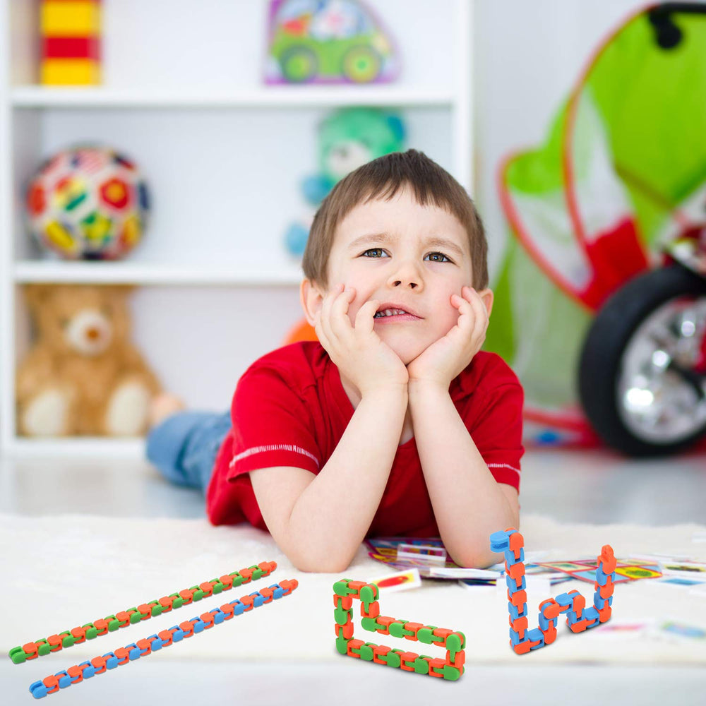 Yeetec wacky tracks allow building letters, numbers, and symbols for play.