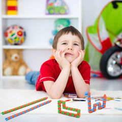 Yeetec wacky tracks allow building letters, numbers, and symbols for play.