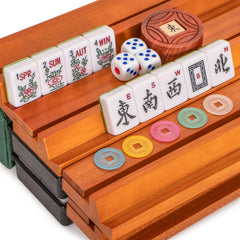 Yellow Mountain Imports wooden racks with magnetic pushers keep tiles organized during play.
