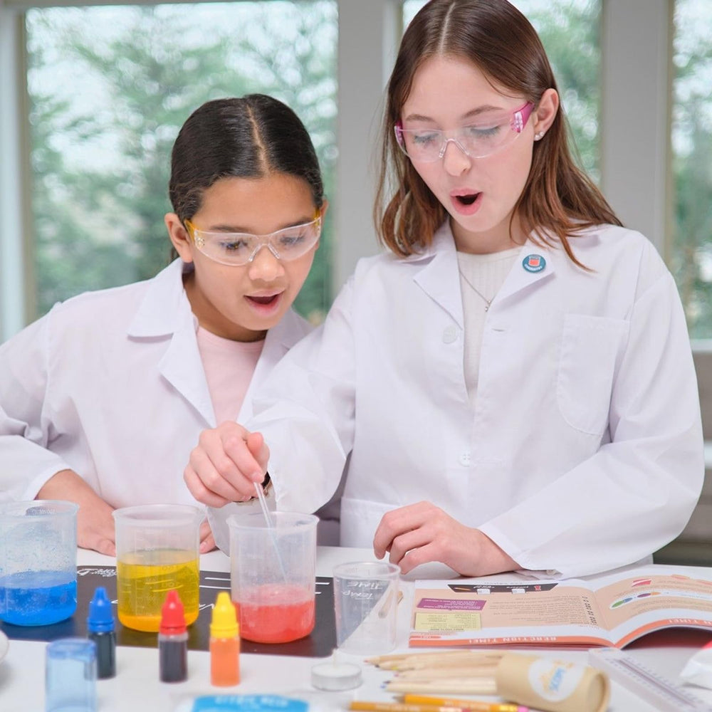 Yellow Scope chalkboard lab mat keeps notes and experiments organized.