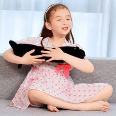 Yeqivo soft plush cat body pillow 130cm in black acts as a comforting sleep companion.