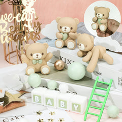 Yinder baby square cake topper enhances cupcakes with a playful bears theme.