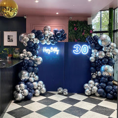YMSZ silver 12-inch balloons complement navy tones with shine.