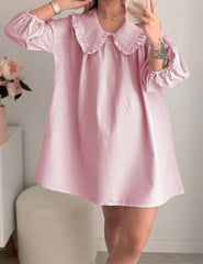 Ynhonra babydoll dress doll collar close-up highlights playful style and light fabric.