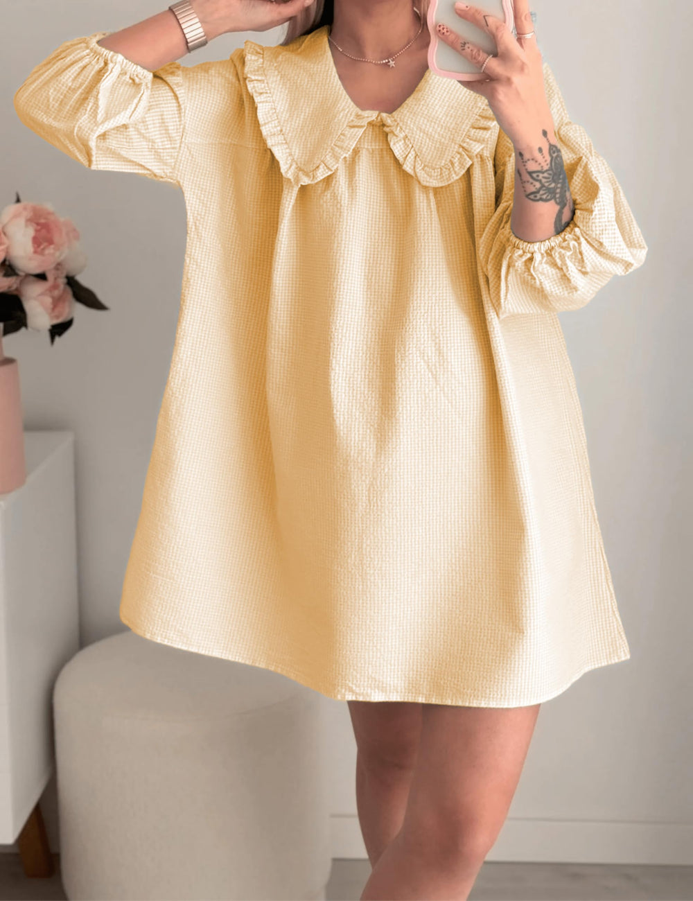 Ynhonra plaid mini dress with puff sleeves ideal for everyday wear and airflow.