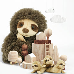 YOHAKI Sloth plush in bedtime setup for cozy snuggles