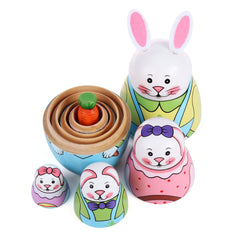 Yoption nesting dolls used as pen and jewelry storage on a desk