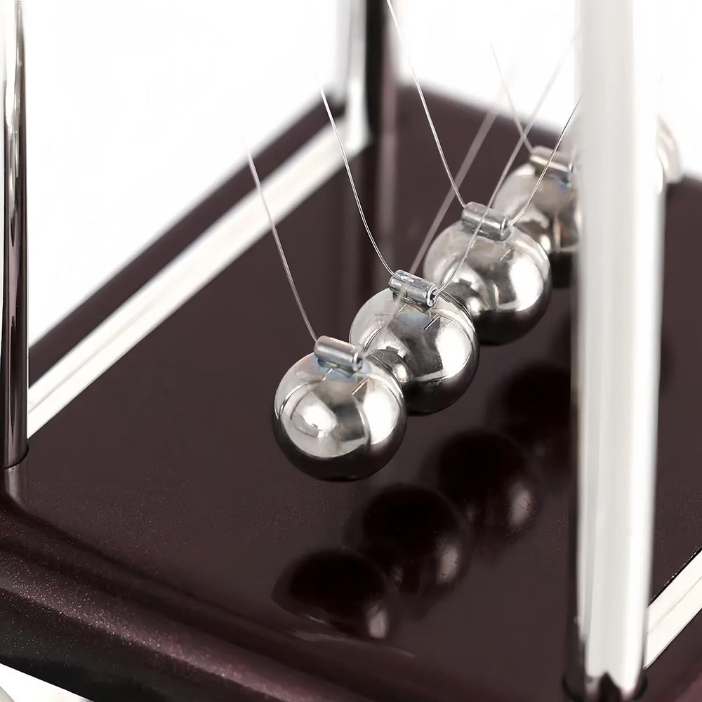 Yoqanr Newton's Cradle closeup-balls captures momentum transfer in action