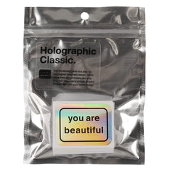 You Are Beautiful in-use holographic stickers on laptop or notebook for daily motivation.