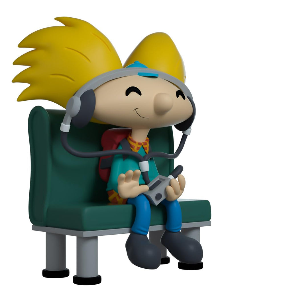 Youtooz Arnold vinyl figure in plaid shirt and blue pants creates dynamic window display.