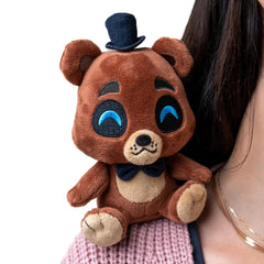Top hat and ears emphasize Freddy's iconic look for shelf or cosplay.