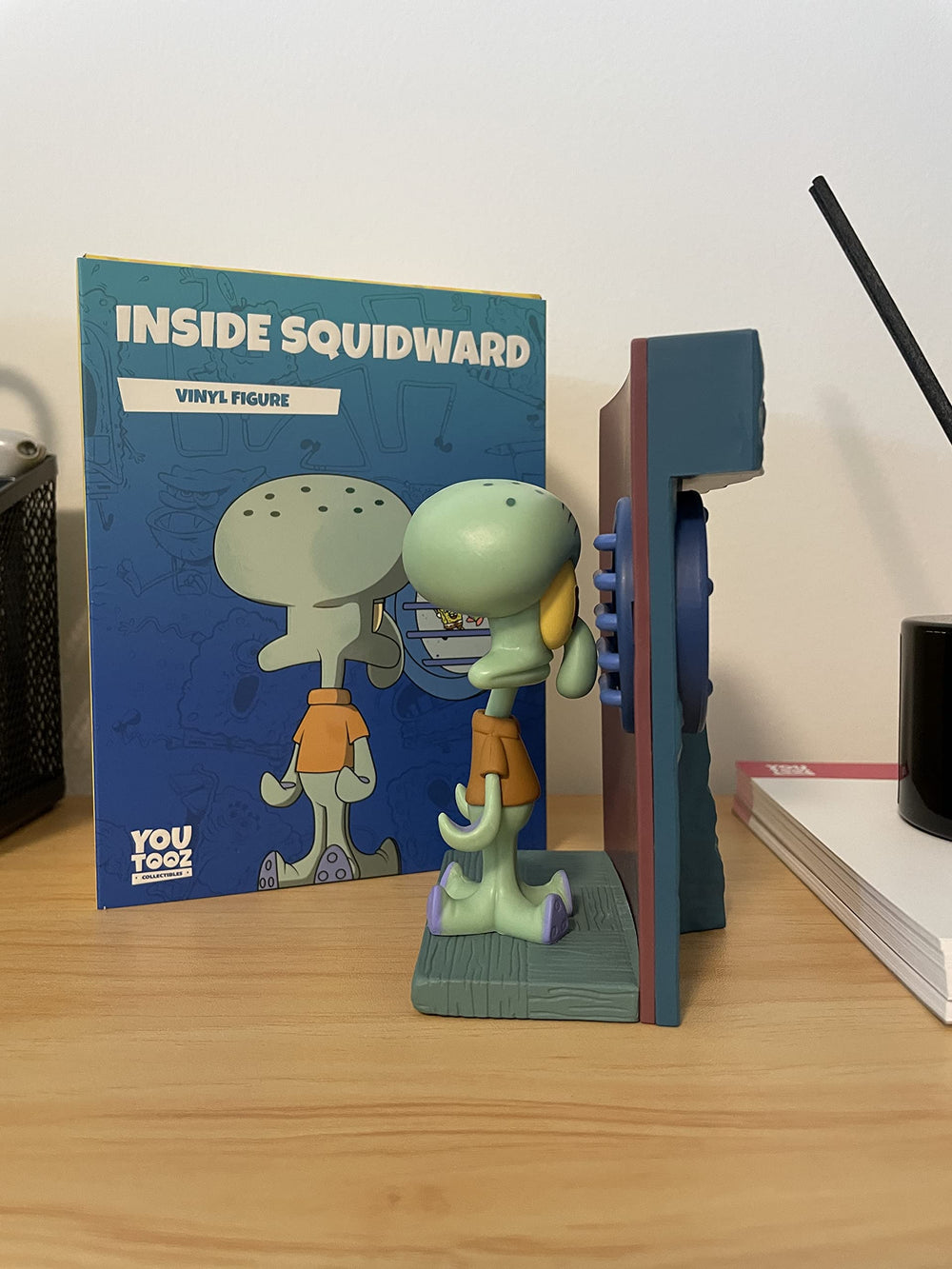 Youtooz Inside Squidward figure; scene-inspired display for fans.