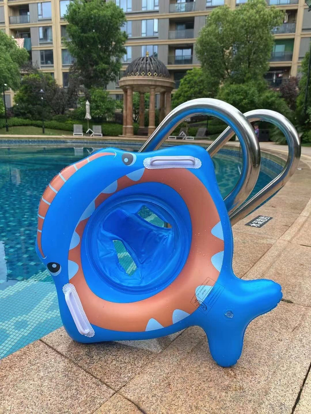 YUERFEILA shark float pictured in a pool setting during playtime.