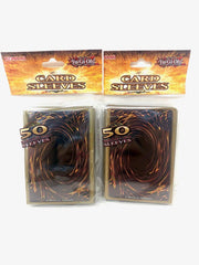 Two packs of Yu-Gi-Oh! Deluxe Sleeves protect decks during duels and travel.