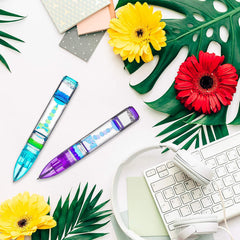 Yue Motion Lava Pens sit on your desk for quick, calming breaks.