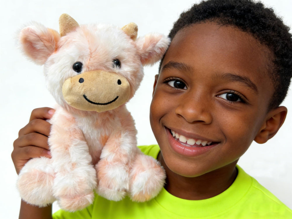 YUKOUQIAN cow plush bedside companion for bedtime and quiet play.