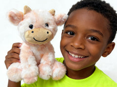 YUKOUQIAN cow plush bedside companion for bedtime and quiet play.