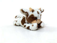 YUKOUQIAN cow plush cozy-bed-use scene highlights versatile child-friendly decor.