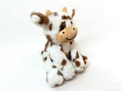 YUKOUQIAN cow plush displayed during family playtime on the living room sofa.