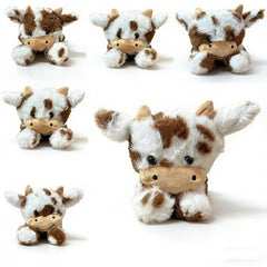 YUKOUQIAN cow plush with soft-fabric closeup showcases a cuddly texture for cozy hugs.