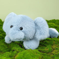 YUKOUQIAN elephant plush resting on a sofa as a comforting companion.