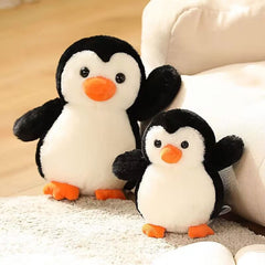 YUKOUQIAN penguin plush held by child, a comforting sleep companion.