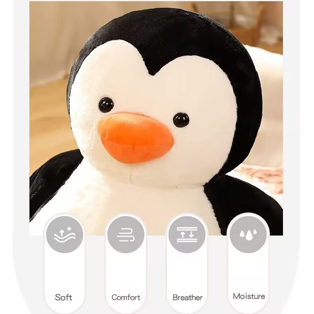YUKOUQIAN penguin plush on couch during TV time.