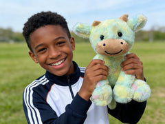 YUKOUQIAN soft fluffy cow plush fabric for comforting hugs.
