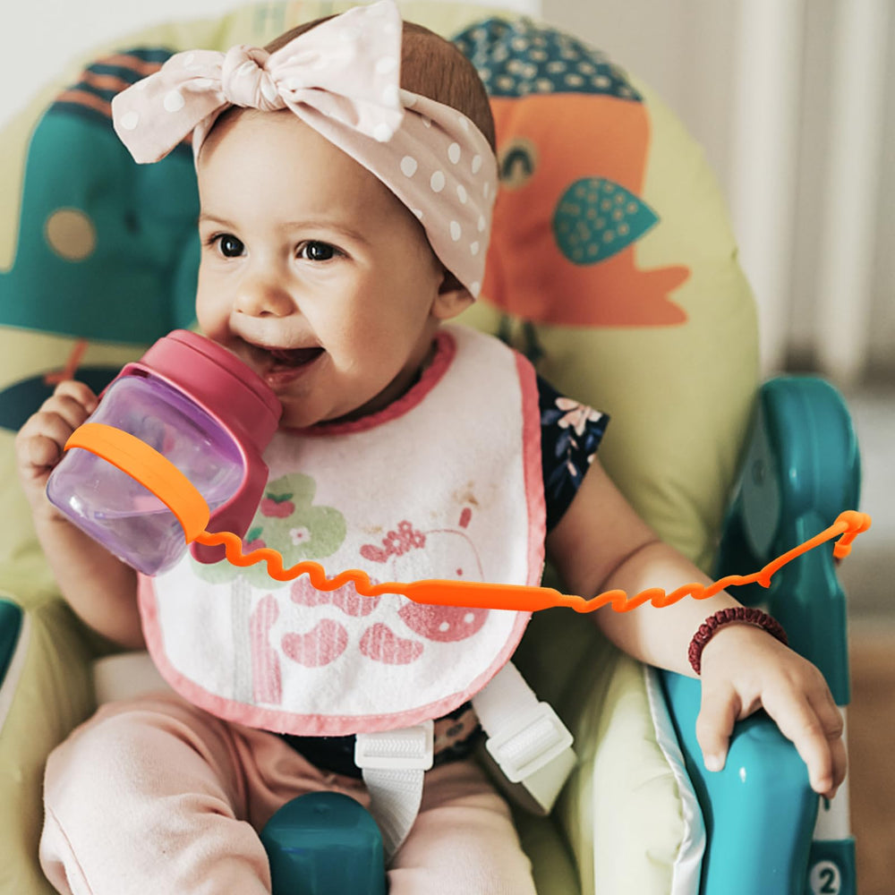 Yunaeduo silicone straps hold sippy cups to strollers for easy access.