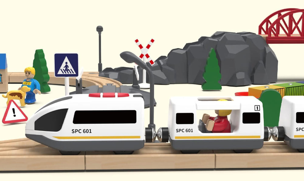 Z MAYABBO battery-operated train moves smoothly on wooden rails.