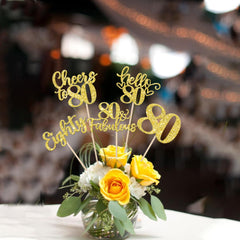 ZHUOWEISM Gold glitter centerpiece sticks set a celebratory mood for milestone parties.